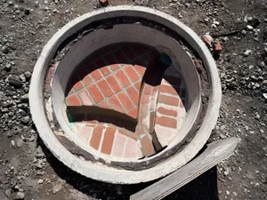 Catch basin and manhole installation on an IR Campbell site